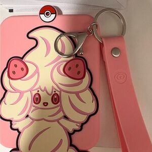 Pokémon card holder/protector with strap